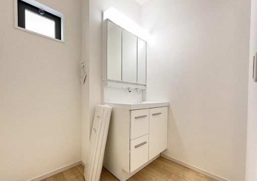相模原市中央区宮下本町１丁目の新築戸建て1号棟の洗面化粧台の写真
