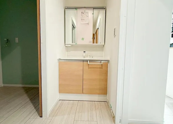 相模原市中央区横山台2丁目の新築戸建て14号棟の洗面化粧台の写真