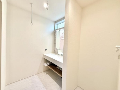 相模原市南区若松1丁目の新築戸建ての洗面化粧台の写真