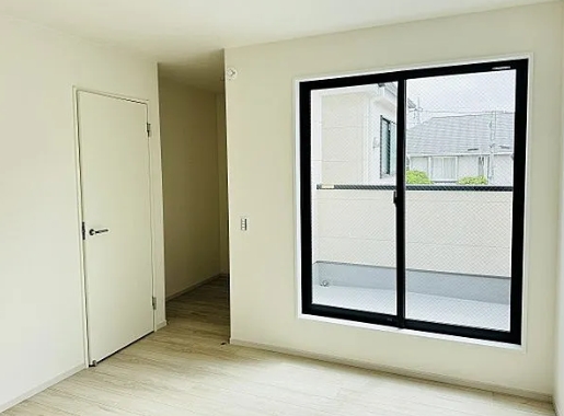八王子市本町の新築戸建て1号棟の洋室1の写真