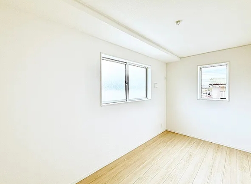 八王子市上壱分方町の新築戸建て2号棟の洋室2の写真