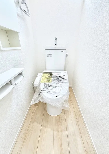 八王子市上壱分方町の新築戸建て2号棟のトイレ1fの写真