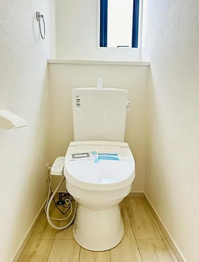 八王子市小比企町の新築戸建て3号棟のトイレ1fの写真