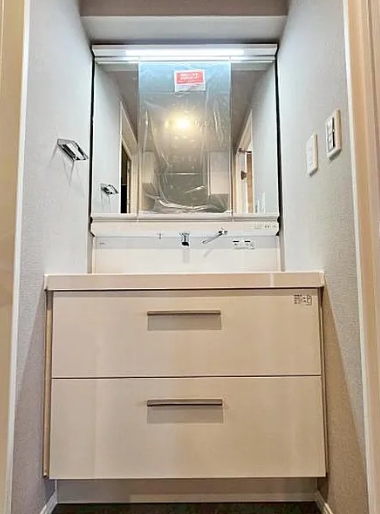 相模原市緑区西橋本4丁目の中古マンションの洗面化粧台の写真