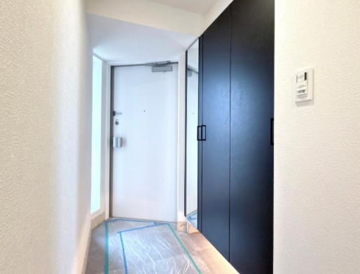 町田市小山ヶ丘1丁目の中古マンションの玄関の写真