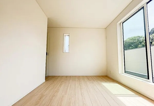 町田市図師町の新築戸建ての1号棟の洋室1の写真