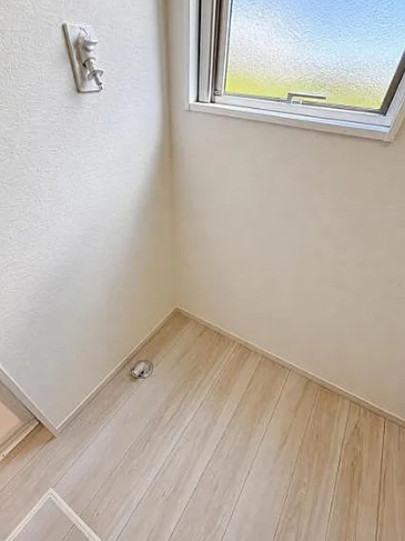 八王子市東中野の新築戸建て2号棟の洗濯機置場の写真