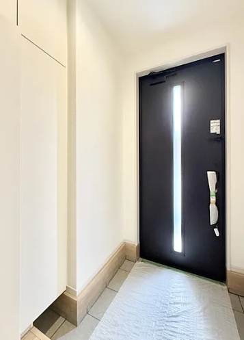 八王子市富士見町の新築戸建て2号棟の玄関の写真
