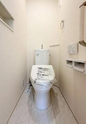 八王子市石川町の新築戸建ての2号棟のトイレ1fの写真