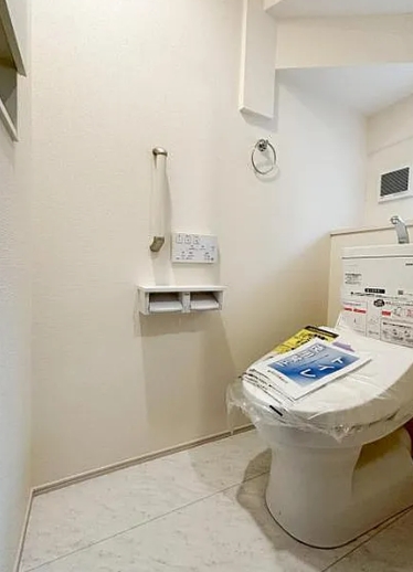 八王子市石川町の新築戸建ての7号棟のトイレ1fの写真