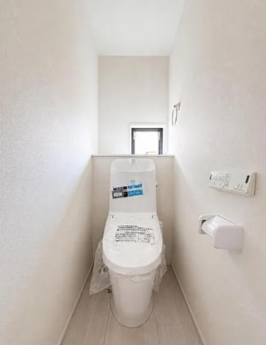 八王子市弐分方町の新築戸建て2号棟のトイレ1fの写真