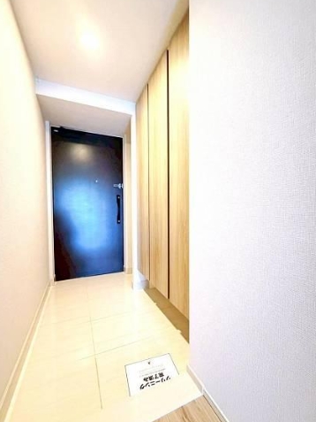 町田市小山ヶ丘6丁目の中古マンションの玄関の写真