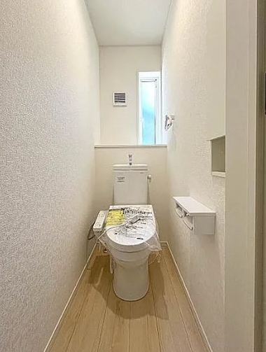 町田市薬師台1丁目の新築戸建ての13号棟のトイレ1fの写真
