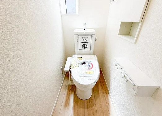 町田市薬師台1丁目の新築戸建ての5号棟のトイレ1fの写真
