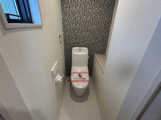 相模原市南区相南2丁目の新築戸建て2号棟のトイレ1fの写真