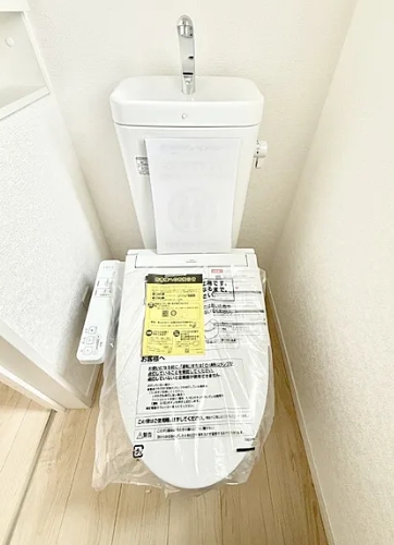 相模原市中央区田名の新築戸建て1号棟のトイレ1fの写真