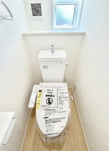 相模原市中央区田名の新築戸建て2号棟のトイレ1fの写真