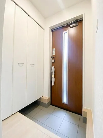 相模原市中央区田名の新築戸建て5号棟の玄関の写真
