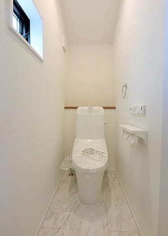 相模原市南区西大沼2丁目の新築戸建てのトイレ1fの写真